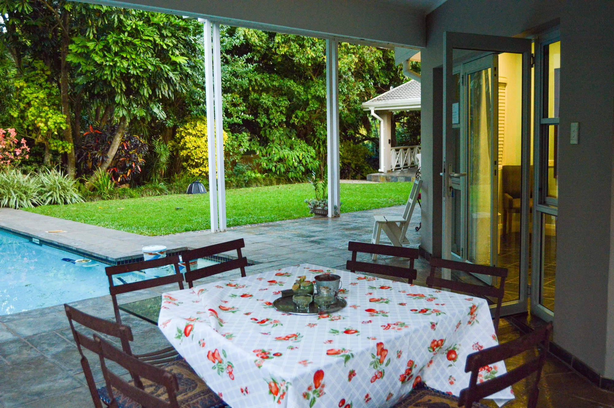 Yellowwoods Bed and Breakfast Empangeni — swimming pool Yellowwoods Bed and Breakfast Empangeni swimming pool bordered by lawn and mature indigenous trees
