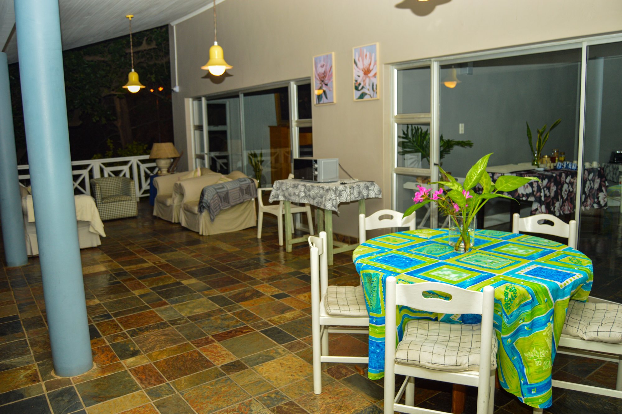 Breakfast tables set on the Yellowwoods terrace facing the garden
