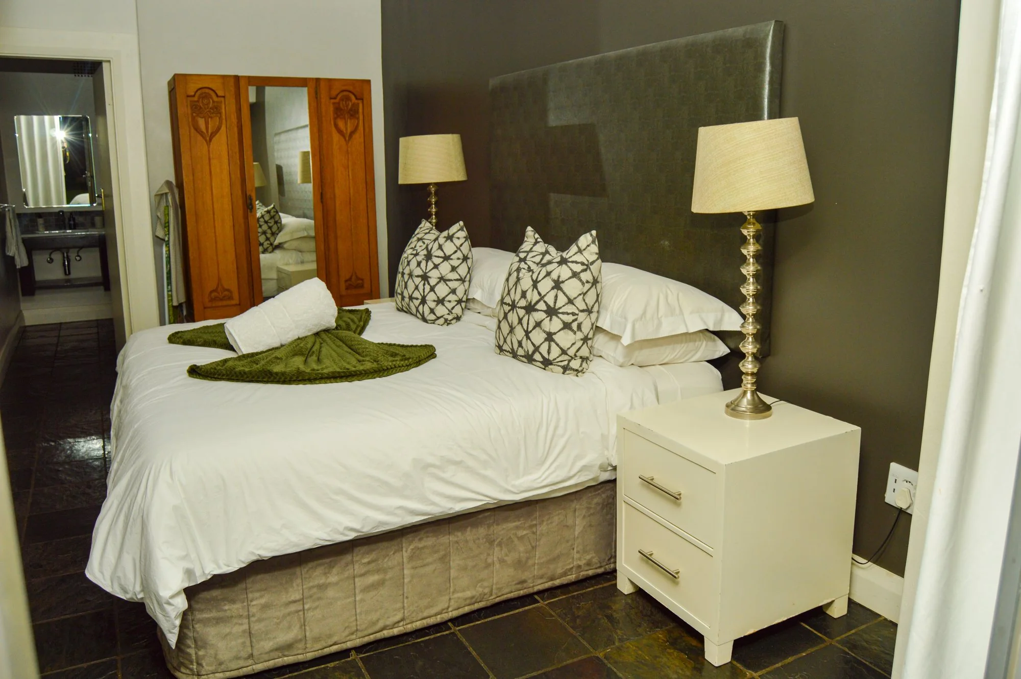 Yellowwoods Bed and Breakfast Empangeni — room two Yellowwoods Bed and Breakfast Empangeni room two with a panelled headboard and crisp white bedding