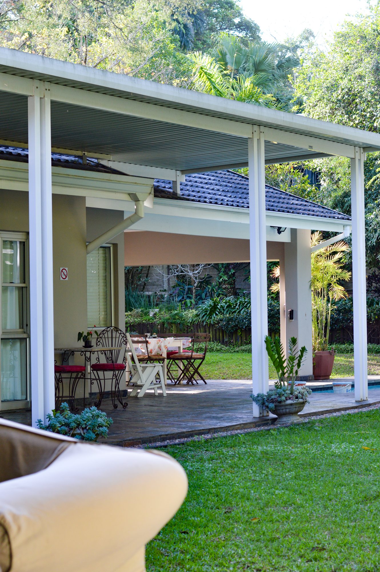 Sheltered veranda looking over the garden at Yellowwoods